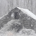 old-barn-in-snowstorm